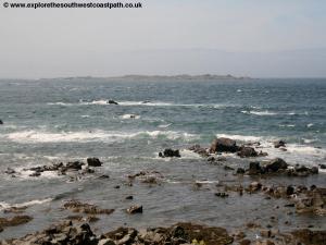 Burhou visible off the coast of Alderney